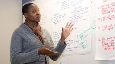 A woman in a classroom.
